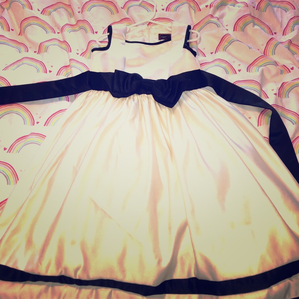 Girls gorgeous occasion dress with bow.